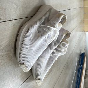 Men’s size 12 all white Adidas running shoes. Worn maybe once in 3 years.